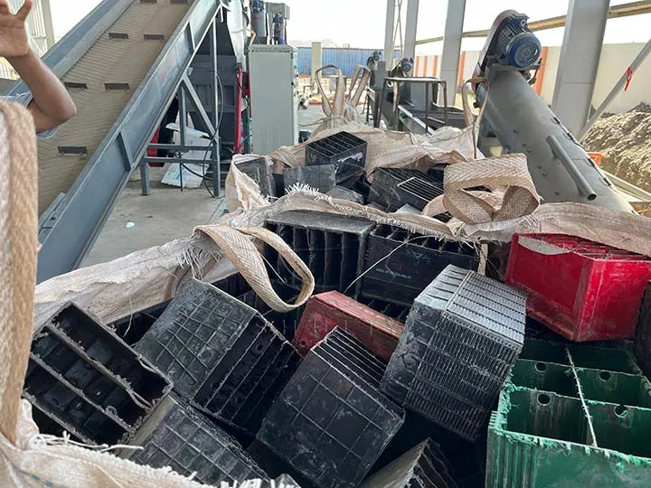 Hard plastic crusher processing waste rigid plastic battery shells and crates on a recycling line
