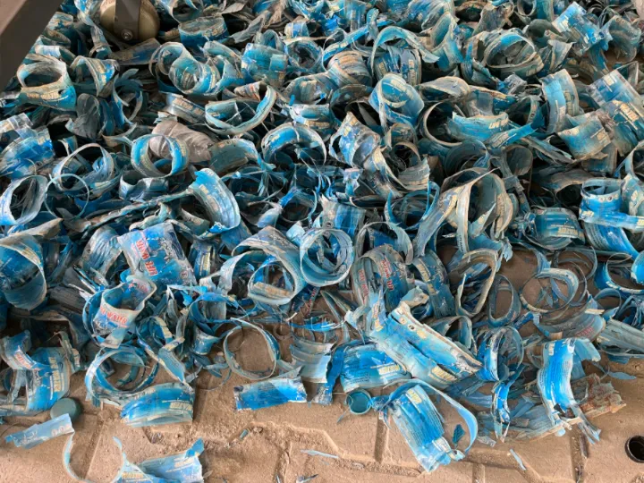 Stack of removed PVC labels from PET bottle recycling process